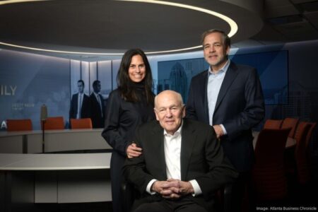 Three people in an office